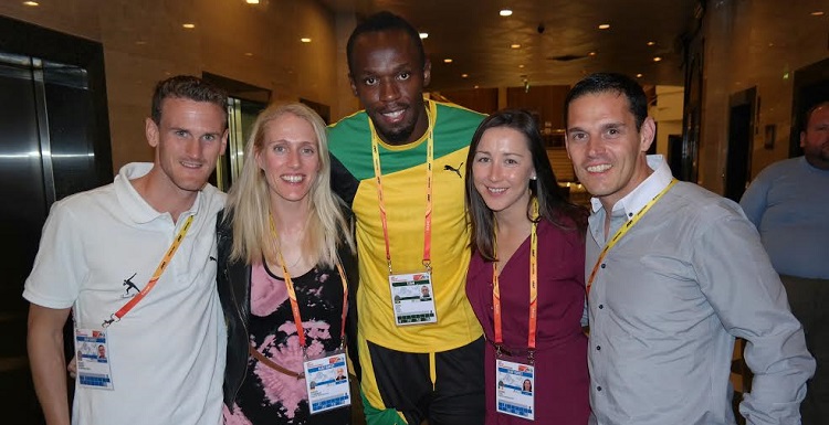 Pace Sports Management representatives, including Gráinne O’Dea, celebrate with Usain Bolt after his win in the 100m at the IAAF World Championships in Moscow in 2013.