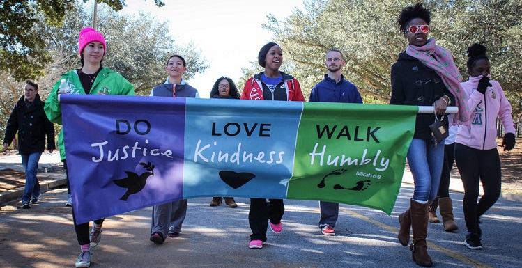 The office recently organized University involvement in activities surrounding Dr. Martin Luther King Day Jr. Day, including participation in a citywide Unity Walk relay that followed the course of the First Light Marathon.