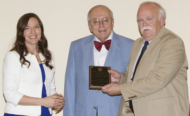 Dr. David Alsobrook, director of the History Museum of Mobile, right, accepts the Outstanding Teaching Partner Award for 2013-2014 from Dr. Clarence Mohr, chair of history, and Dr. Julie Estis, president of the Faculty Senate.