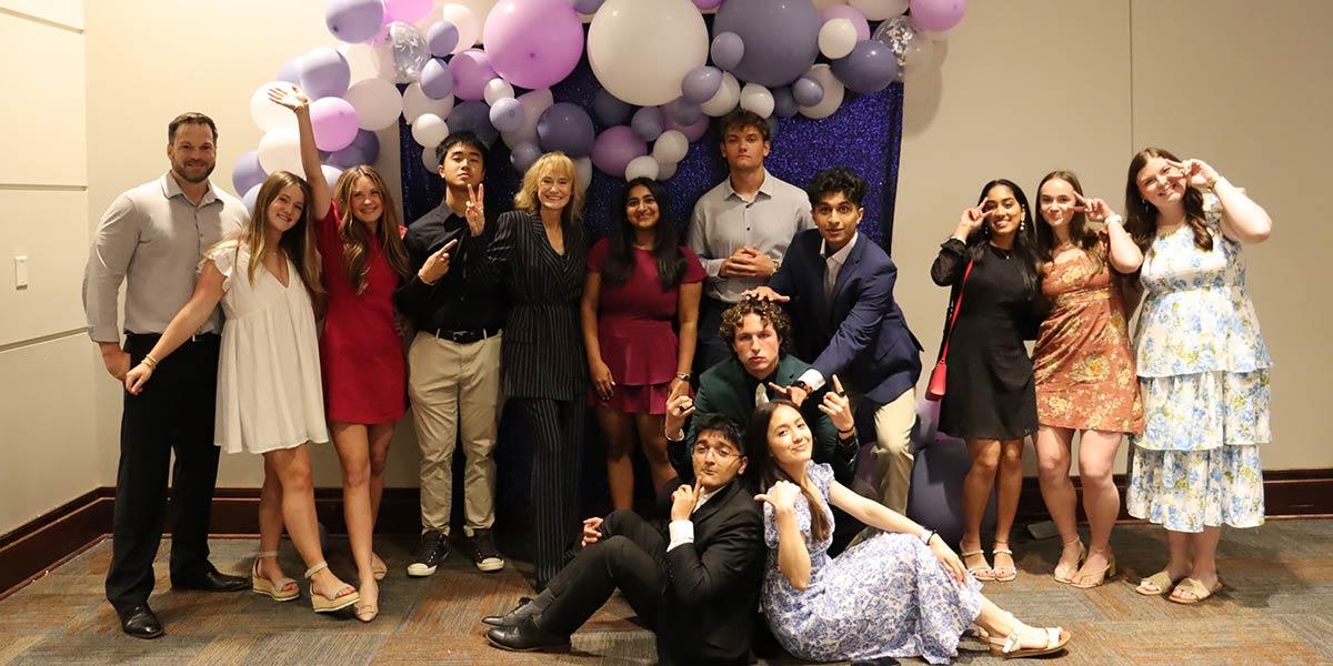 AED in front of balloons.