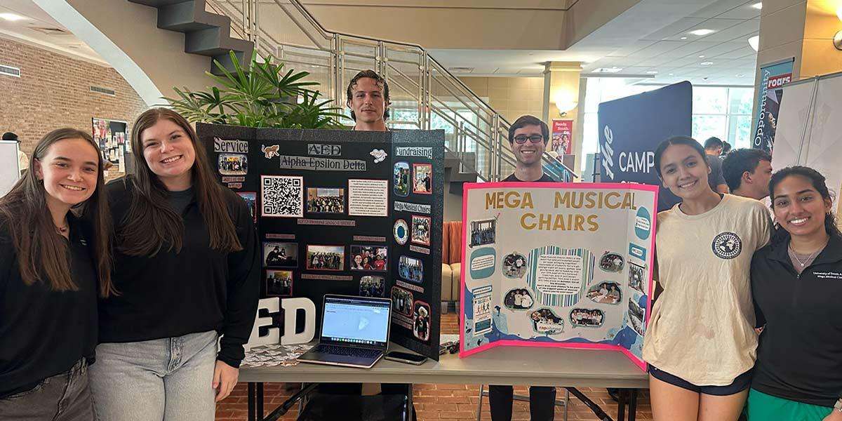 AED at student center with musical chairs display,