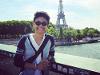 Study Abroad Student in front of Eiffel Tower