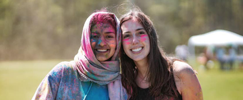 Two women attending Holifest.