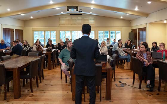 view of attendees from behind the speaker