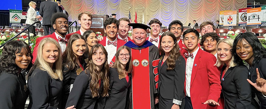 Eighteen Southerners pictured with President Bonner following Presidential Inauguration at the USA Mitchell Center - September 23, 2022
