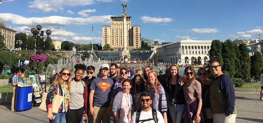 Kiev. This picture is on Independence Square where both the 2004 Orange Revolution and 2014 Euro Maidan Revolution (Revolution of Dignity). The students are pictured with our local contact, Inna, and our guide, Galina. Inna was part of the protests and had family on both sides during the Euro Maidan Revolution. Galina was a journalist who was right in the middle of all of the protests and witnessed history firsthand. A few nights later, we actually had dinner in a speakeasy below our feet. It's hidden under the square and it's called The Last Barricade. The theme of the restaurant is revolution so the password to get in was the Ukrainian phrase "always fight".  