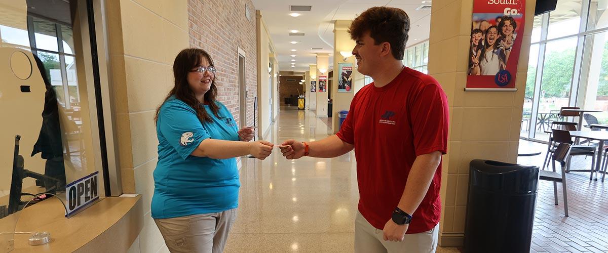 Student sharing AMC ticket with friend 