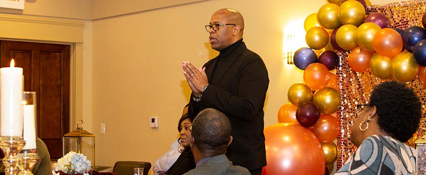 Dr. Mike Mitchell speaking in Student Center at BFSA event.