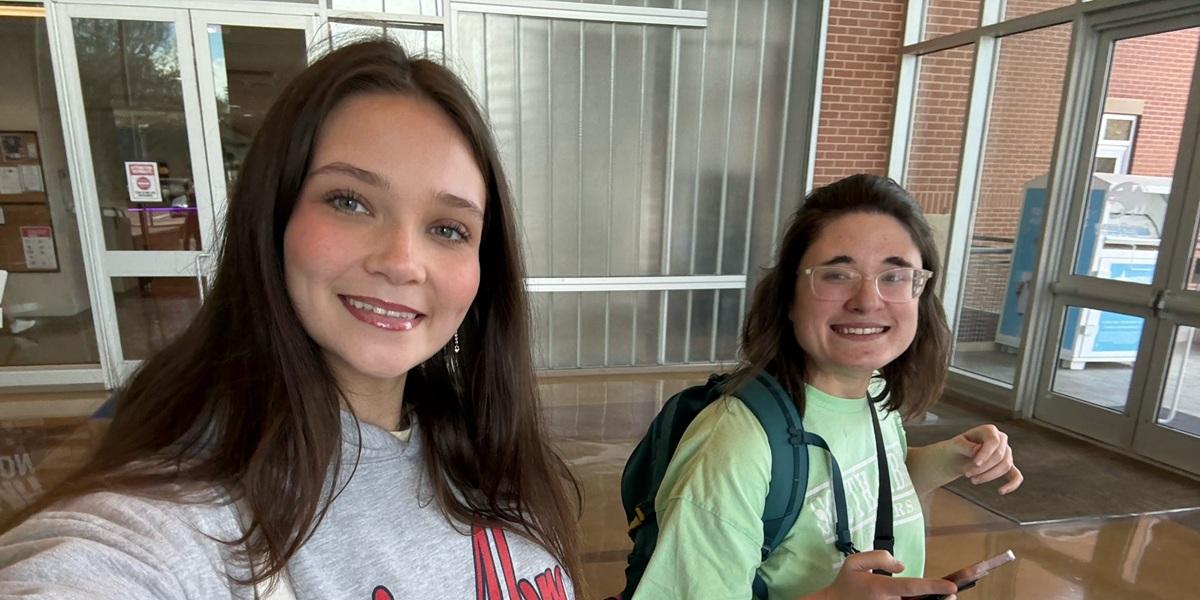 Passage USA student taking a picture with their mentor in the student recreation center.