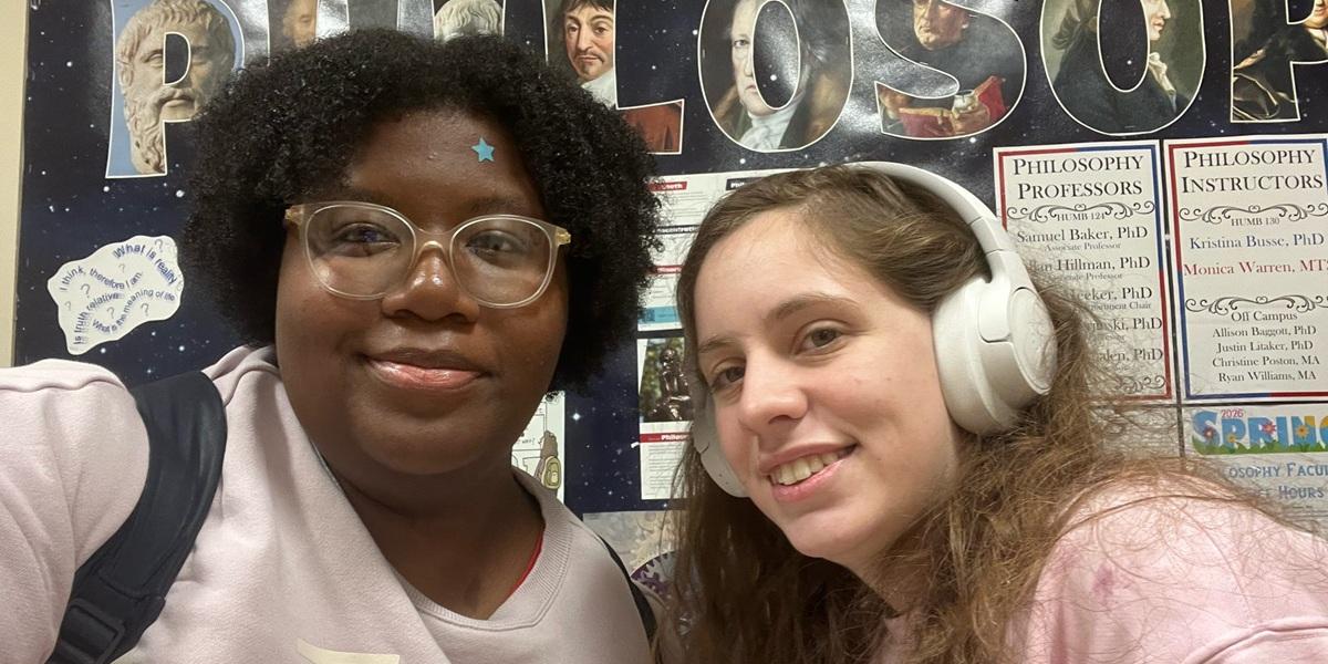 Passage USA student taking a picture with their mentor on campus