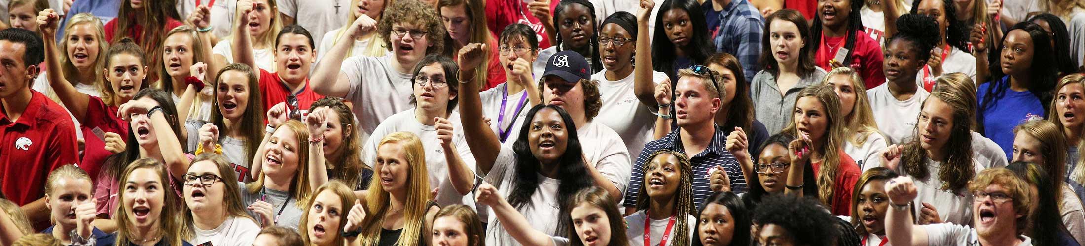 A Crowd of USA students cheering.