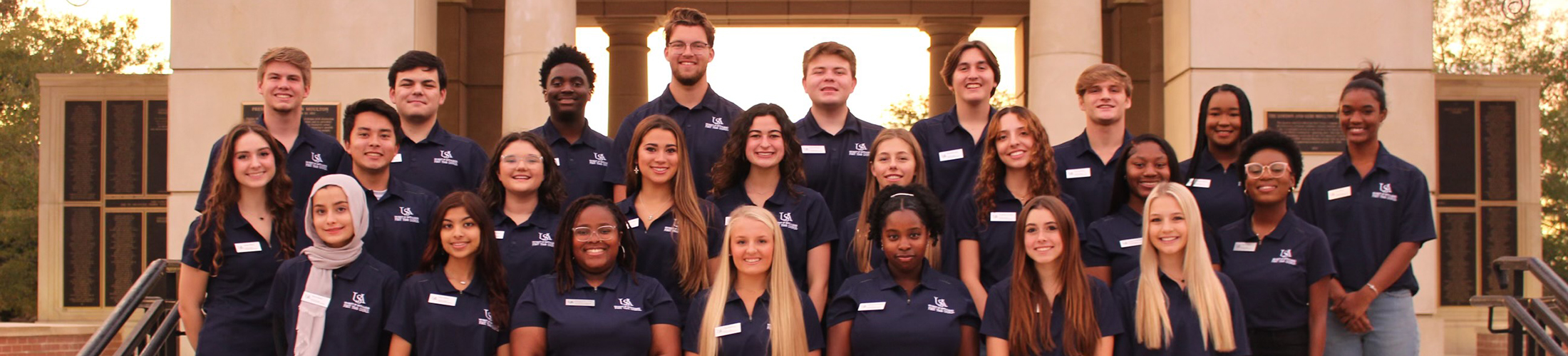 First Year Council group photo in front of Moulton Tower.