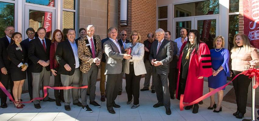 Ribbon cutting for macqueen ceremony