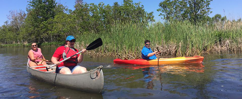 Students kayaking.