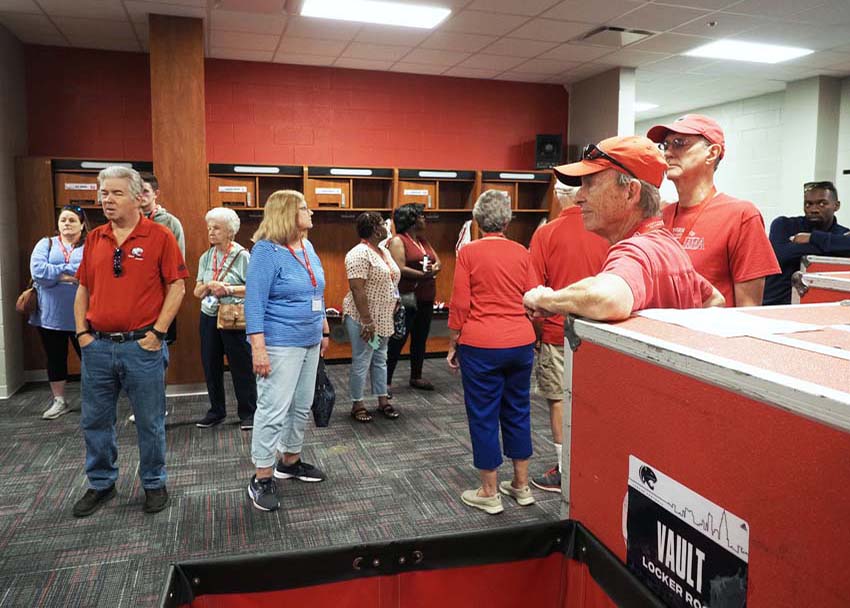 Group touring football field.