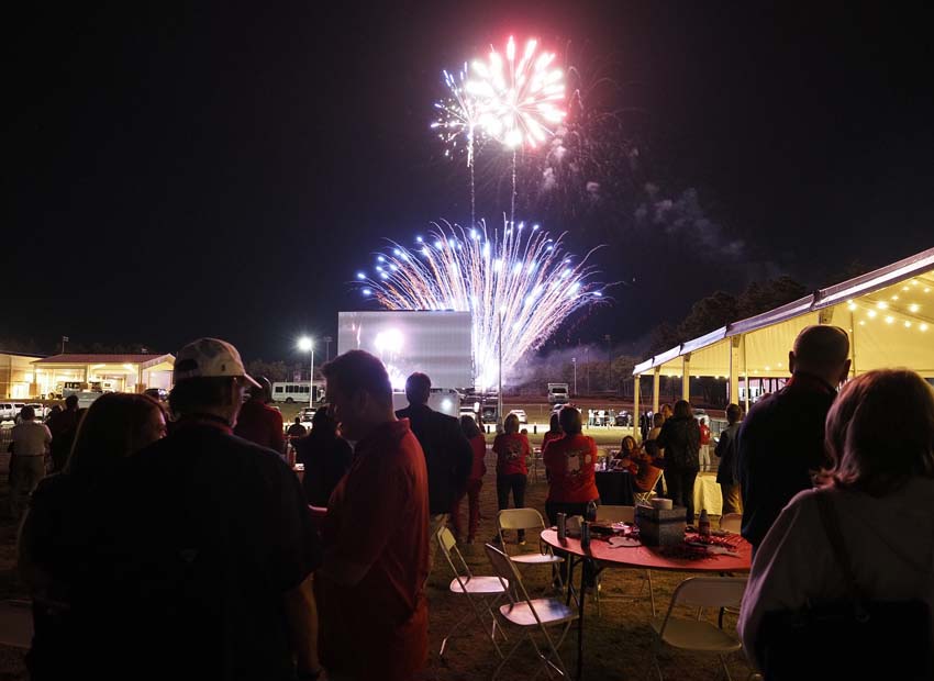 People watch the fireworks exploding at the All Class Party 2022