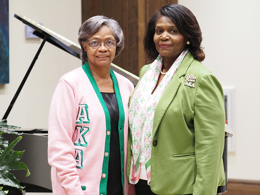 Two ladies in their Greek Attire at reunion.