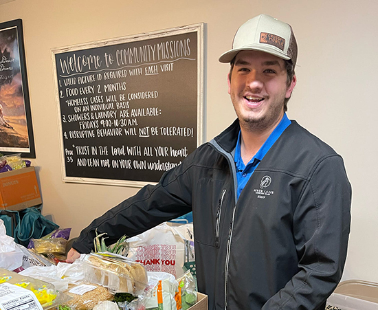 Passage USA Student separating food at Community Missions at Tillman's Corner.