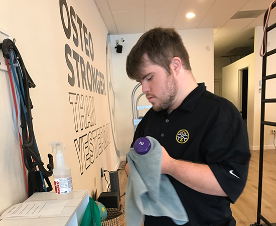 Noah cleaning equipment at Osteostrong.