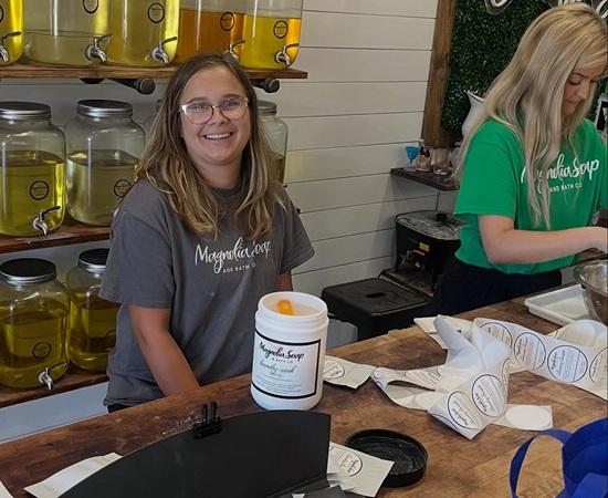 Passage USA student at their internship at Magnolia Soup and Bath