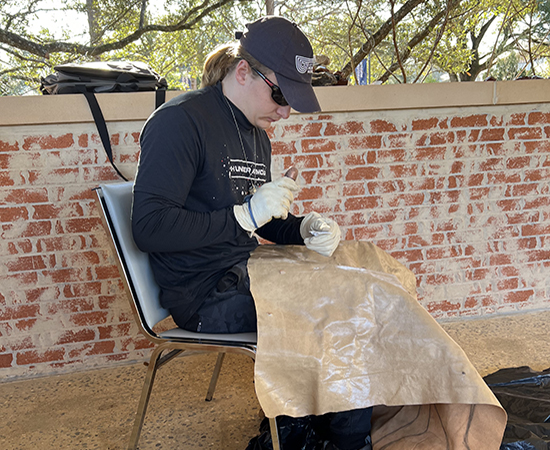Passage USA student working outside.