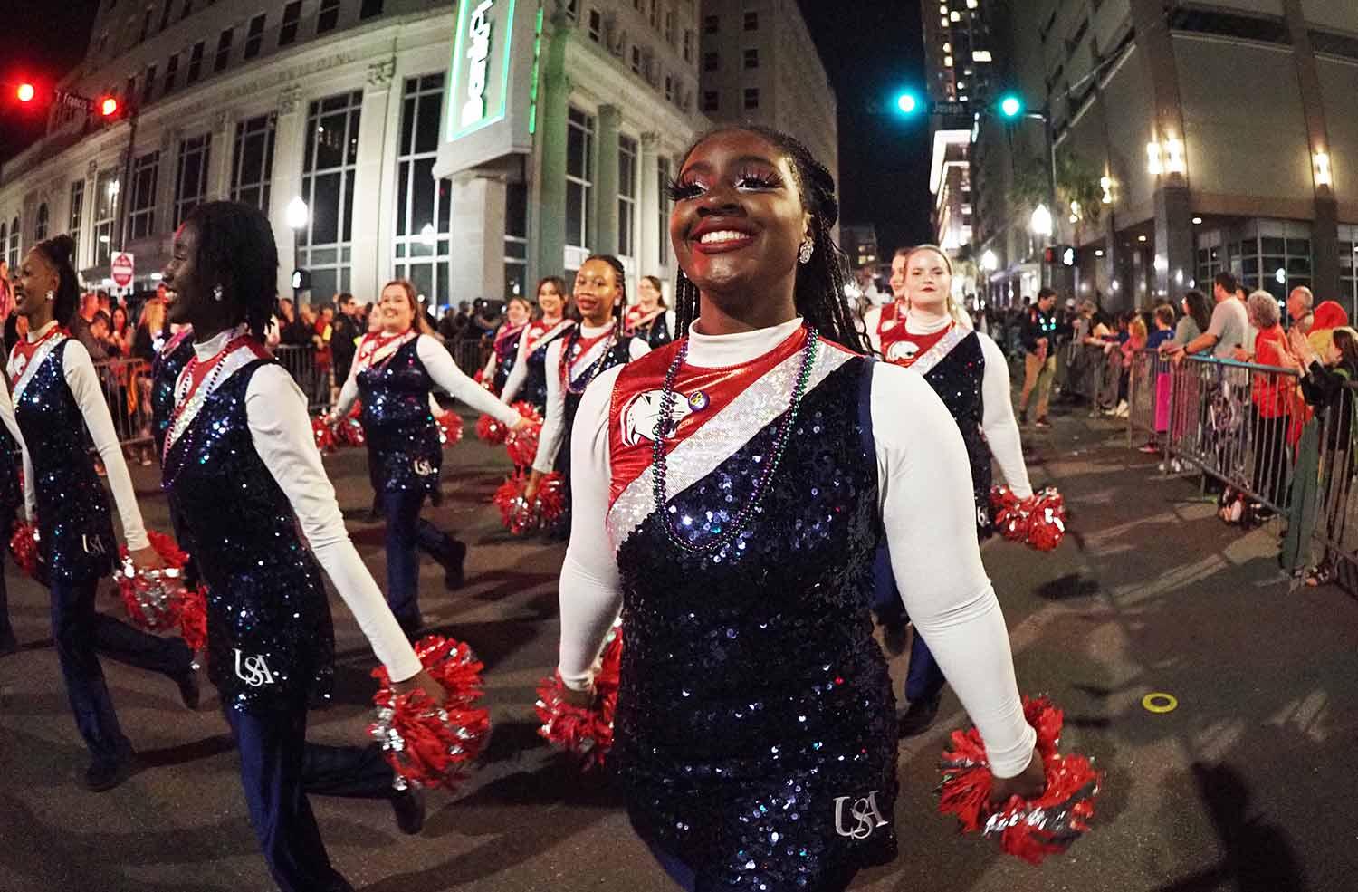 Dance team marching in parade.