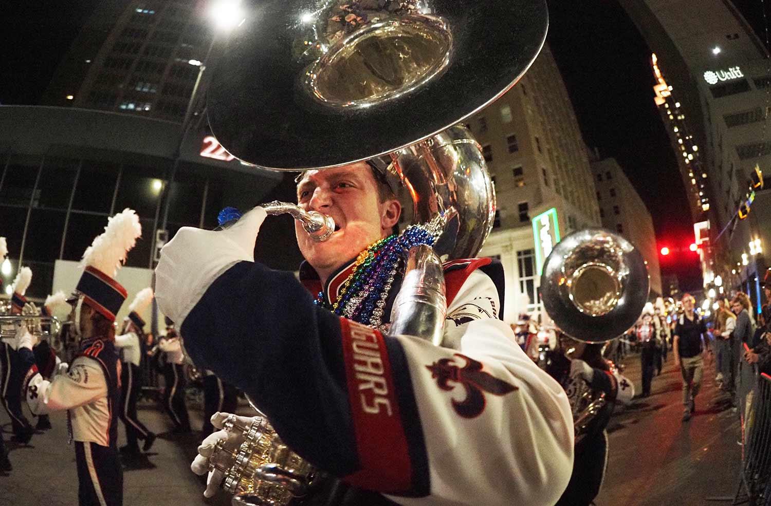 Tuba player playing in parade