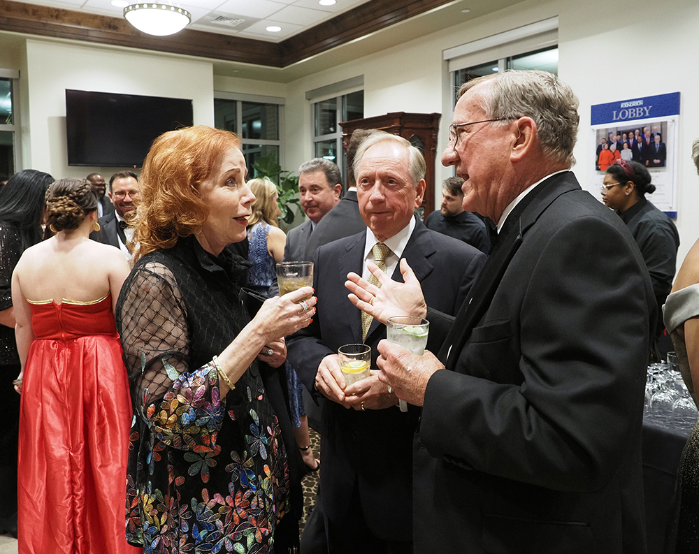 People talking at reception.