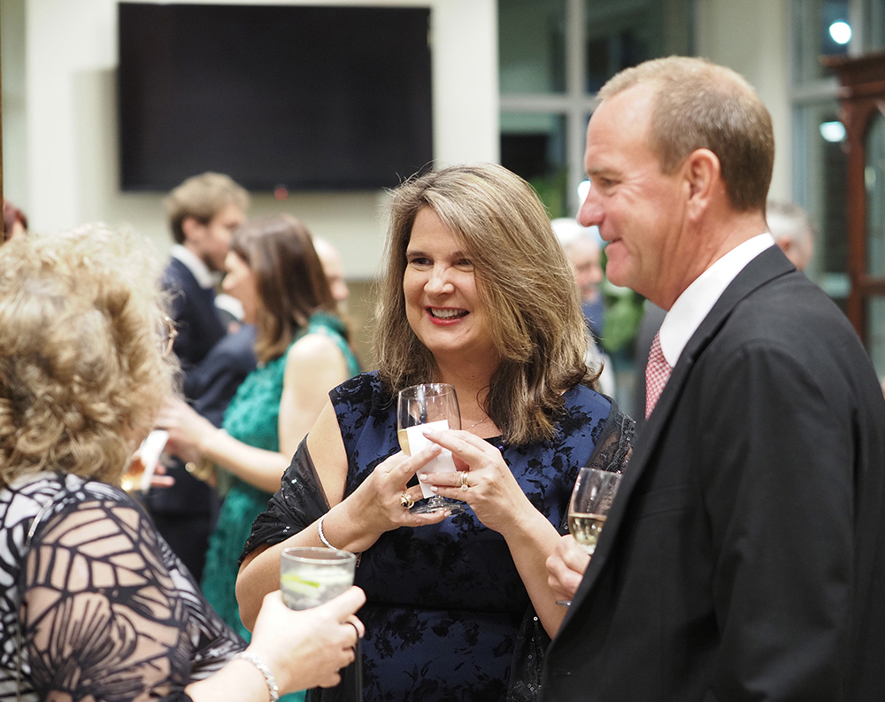 People laughing at reception.