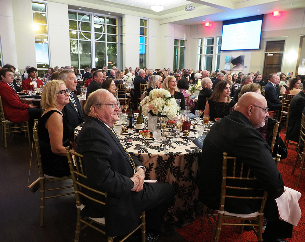 Crowd watching award ceremony.