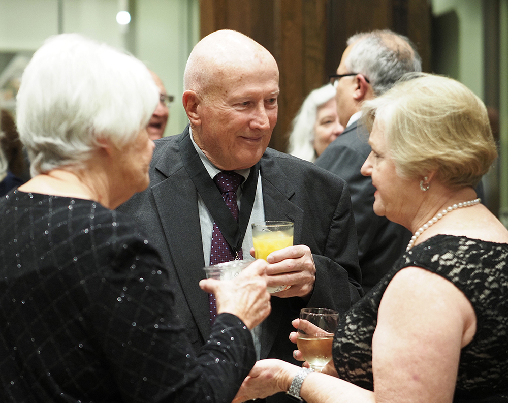 People talking at reception.