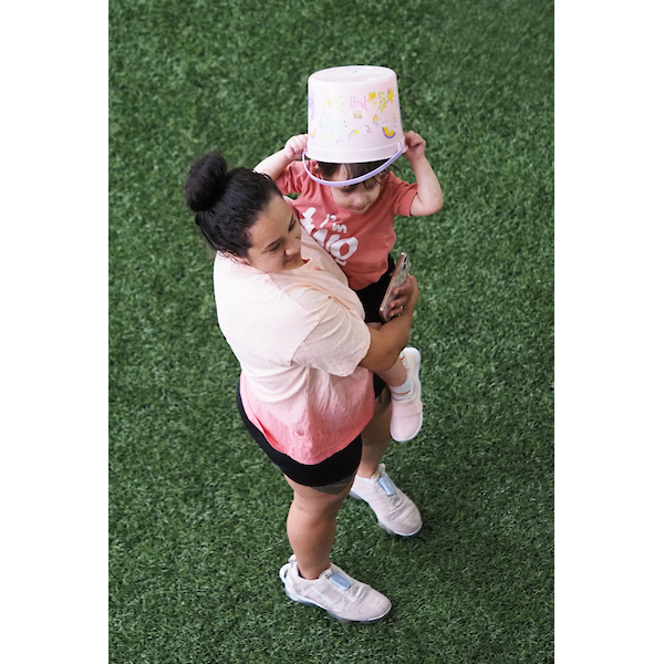 mother and child with Easter basket helmet