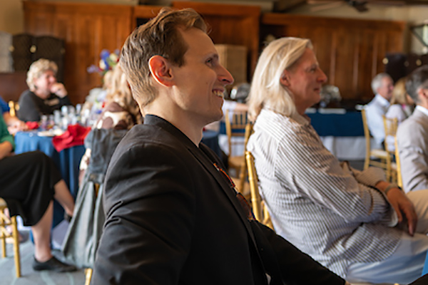 Alumni attendees listening in on speakers