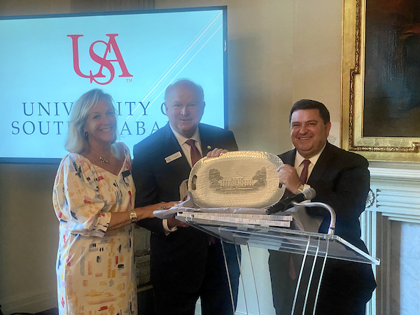South Alabama President Jo Bonner receiving a gift at Alumni & Friends.