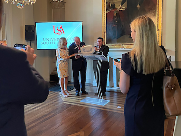 South Alabama President Jo Bonner receiving a gift at Alumni & Friends.