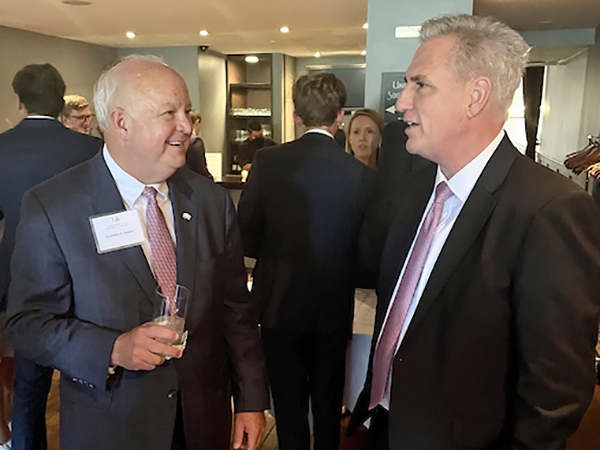 South Alabama President Jo Bonner having a conversation with a South Alabama Alumni