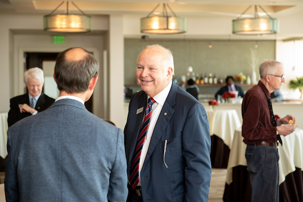 President Jo Bonner socializing with Alumni at the Alumni & Friends Event
