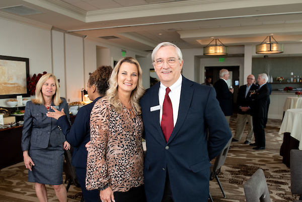 South Alabama Alumni posing for a picture at the event.