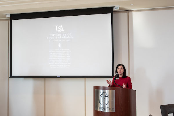 South Alabama Alumni speaking at the Alumni & Friends event.