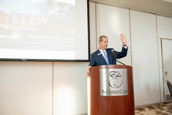 South Alabama Alumni speaking at the Alumni & Friends event.