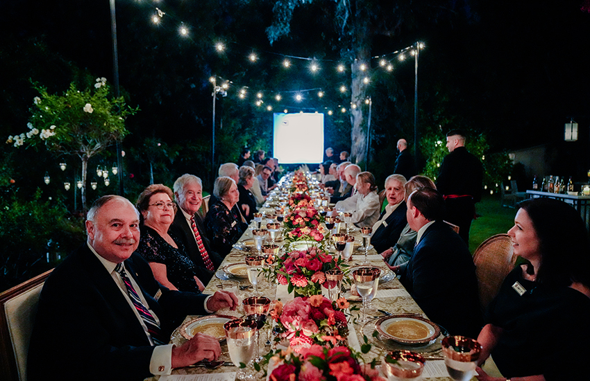 Group shot down the dinner table.