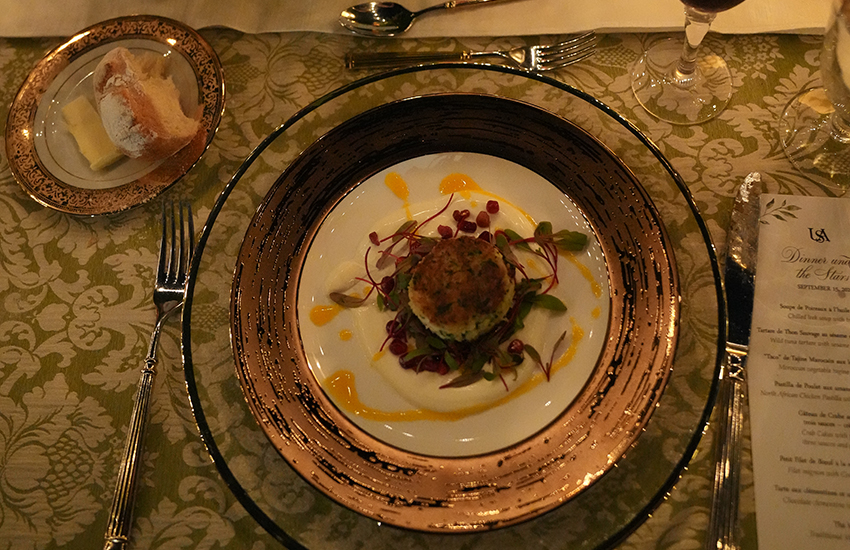 Place setting with food on it.