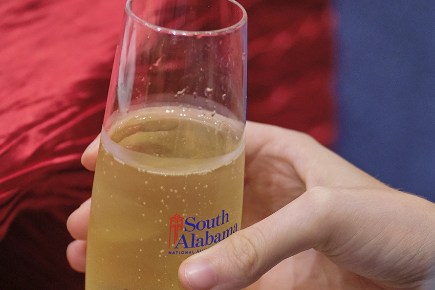 Champagne being served in South Alabama glassware