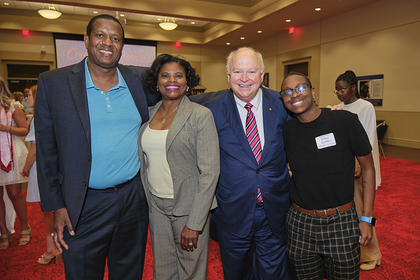 South Alabama President Jo Bonner taking a Picture with future South Alabama Alumni