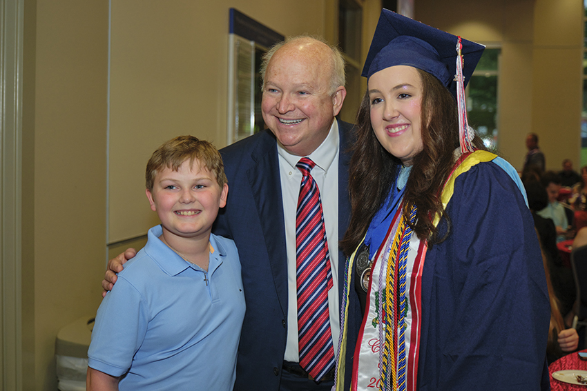 South Alabama President Jo Bonner taking a Picture with future South Alabama Alumni
