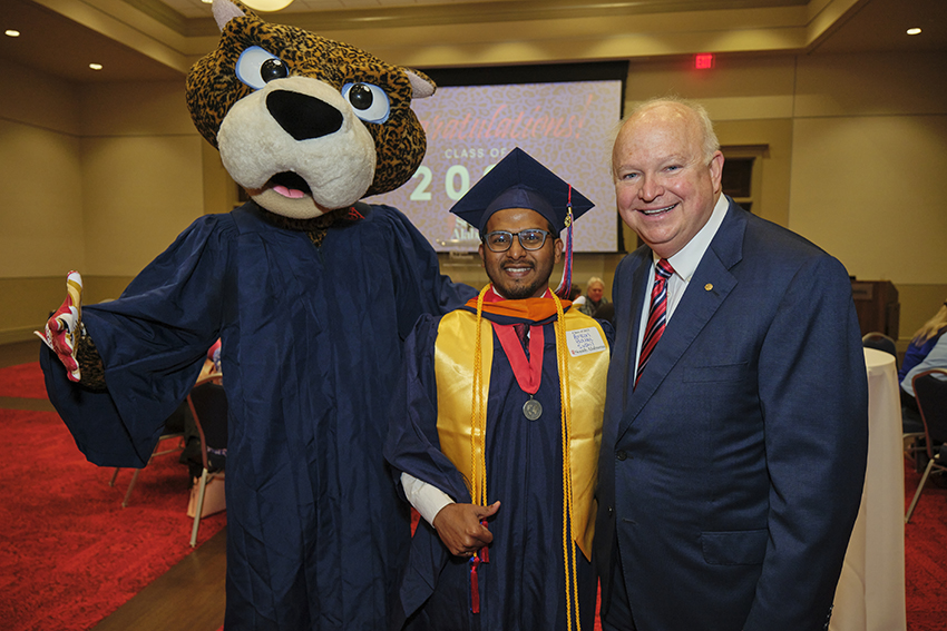 South Alabama President Jo Bonner taking a Picture with future South Alabama Alumni
