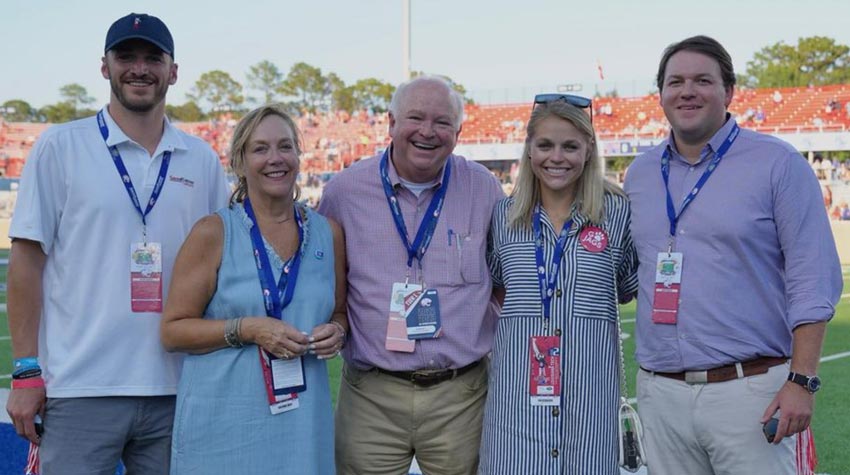 President Bonner and first lady with their children at Hancock Whitney Stadium.