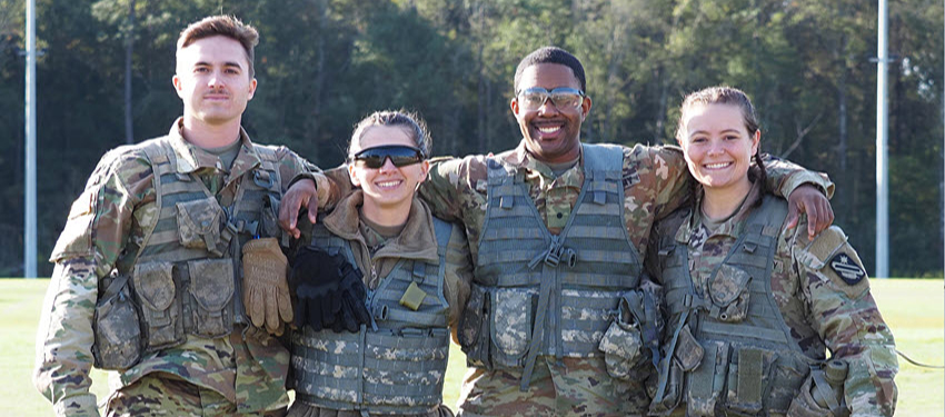 four cadets in uniform