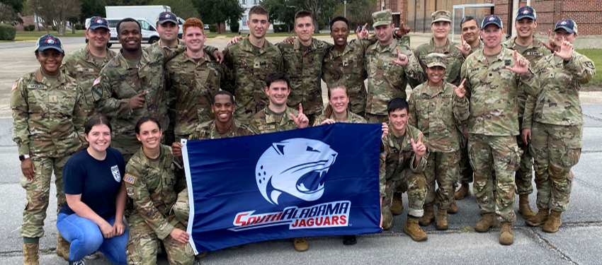 Entire team photo with South Alabama flag