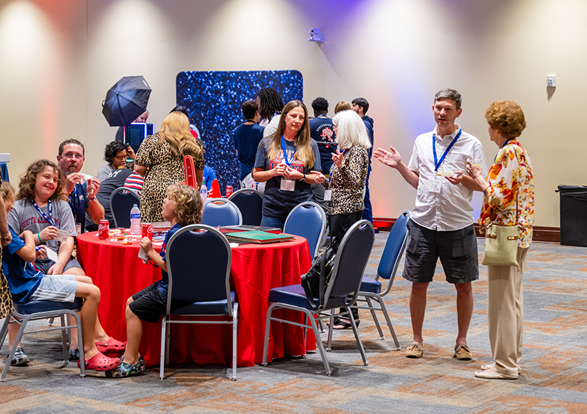 A group of alumni at an event.